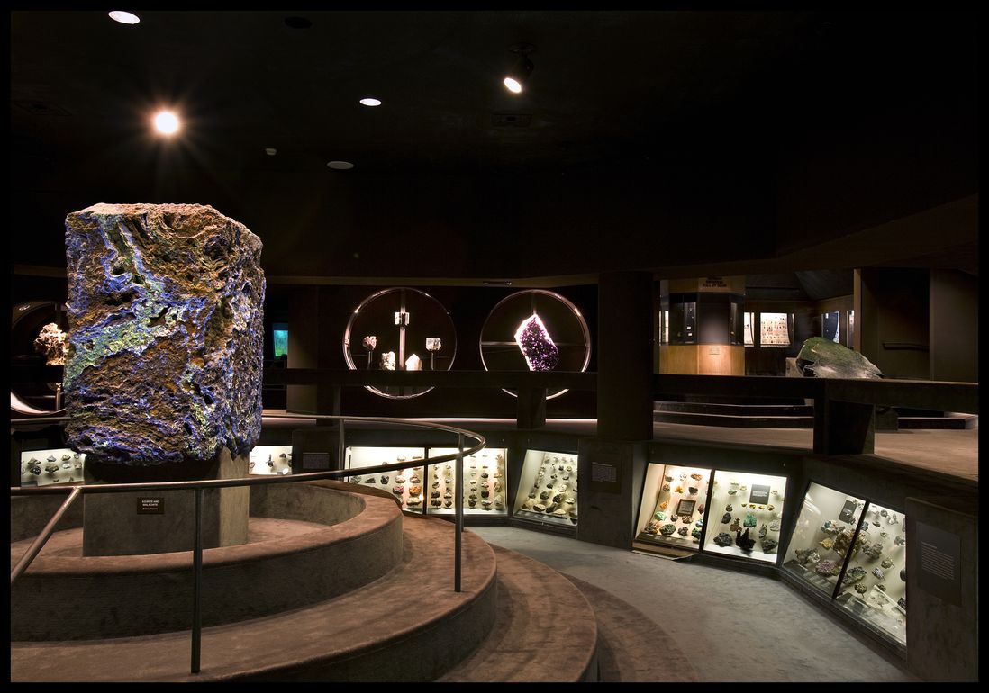 A current shot of the Museum’s Halls of Gems and Minerals, showing the 4.5-ton block of azurite (blue), malachite (green), and copper ore. (© AMNH/R. Mickens)